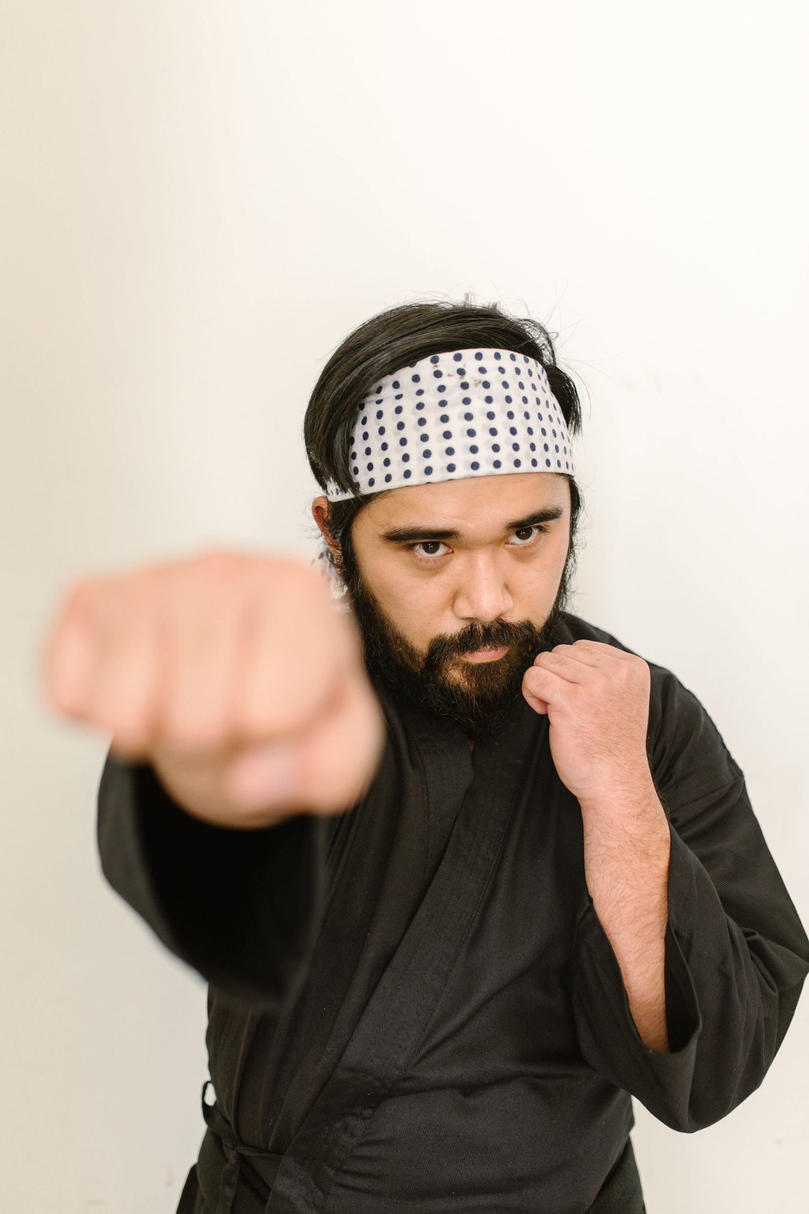Sensei Rohan Iyer throwing a punch toward the camera